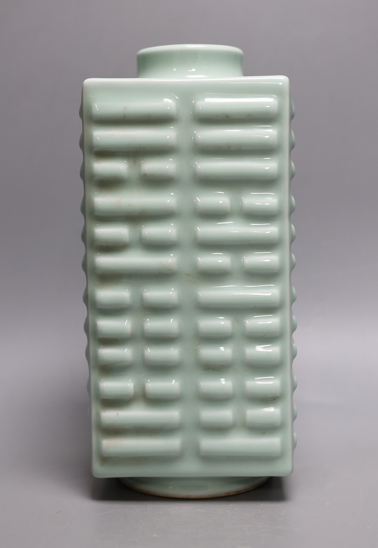 A Chinese celadon glazed cong form vase, Guangxu mark, 27cms high